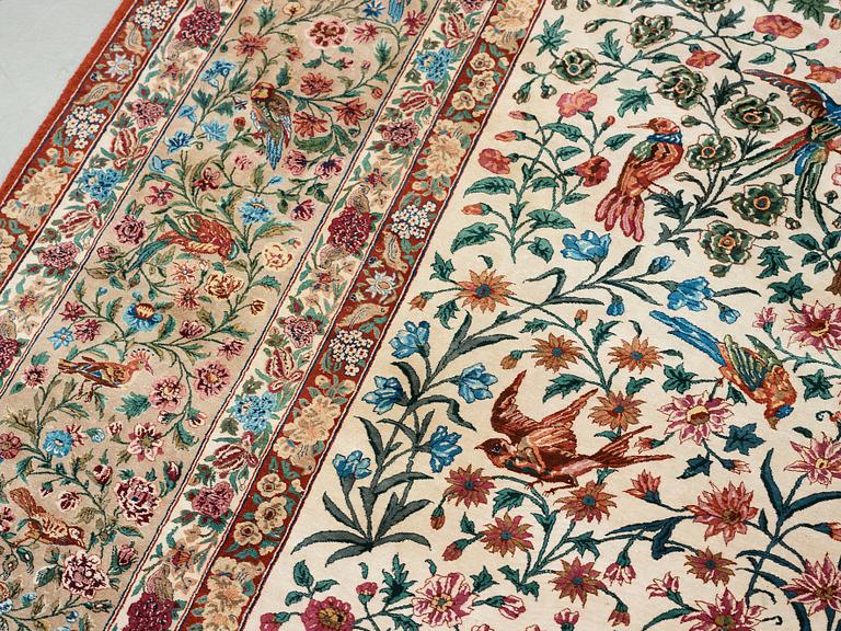 A CARPET, "Golo Bolbol" (="Flower and bird"-motive), a silk Esfahan figural, ca 337 x 243,5 cm, Mohammad Seirafian.