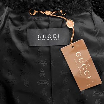 GUCCI, a black persian lamb jacket, size 40.