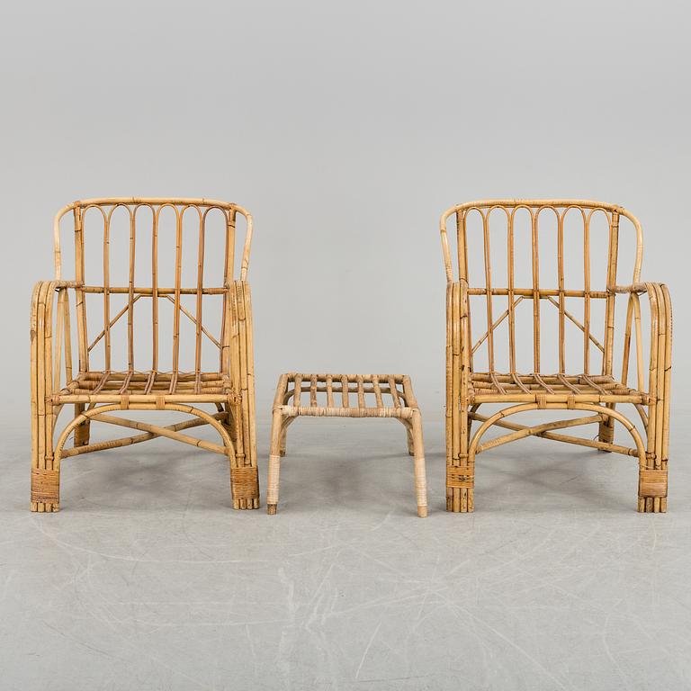 A pair of Garden Armchairs with one stool, mid 20th century.