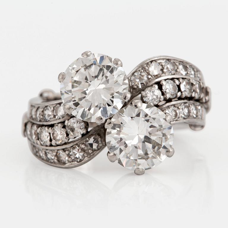 A WA Bolin platinum ring set with two round brilliant-cut diamonds with a total weight of ca 3.50 cts.