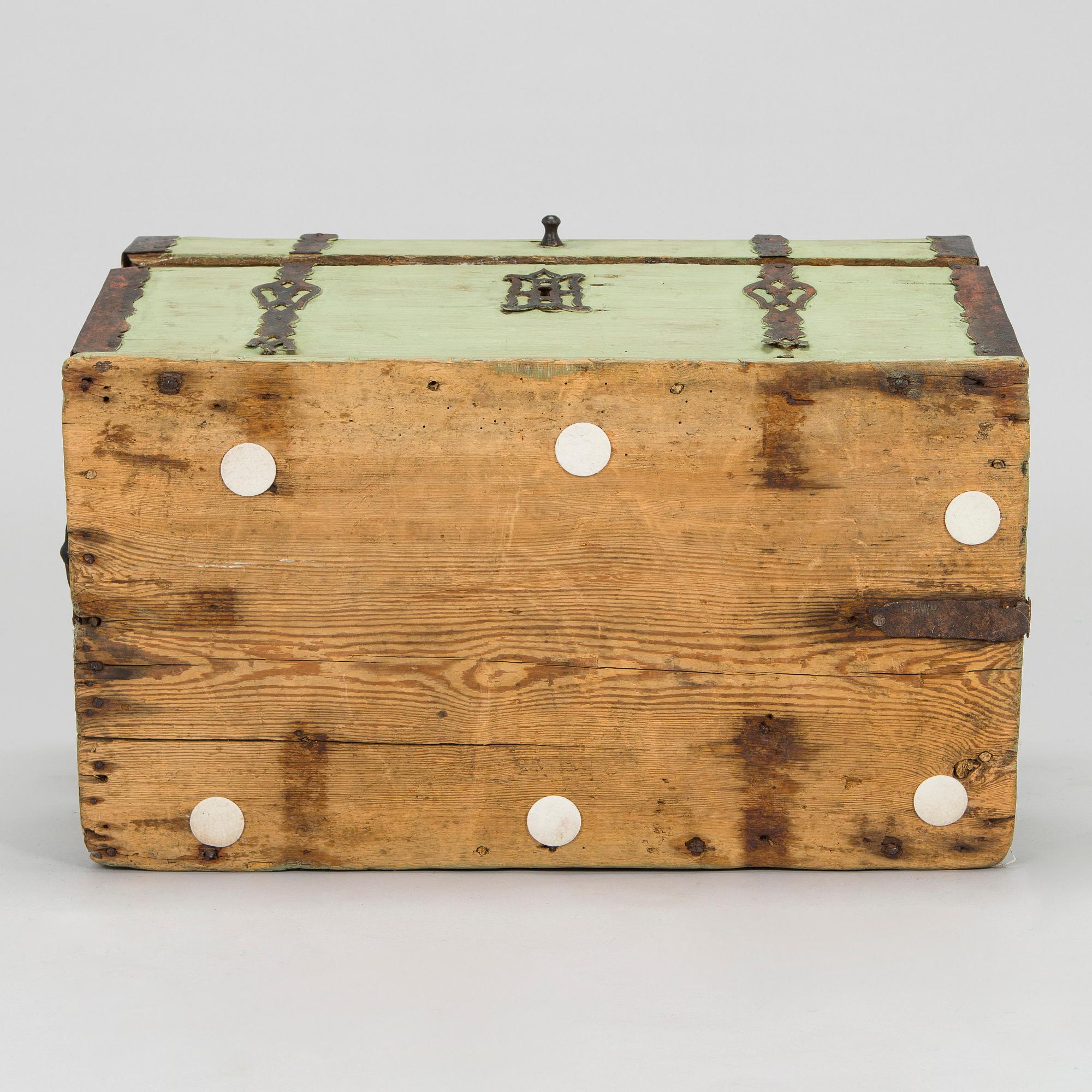 A wooden storage chest dated year 1777.