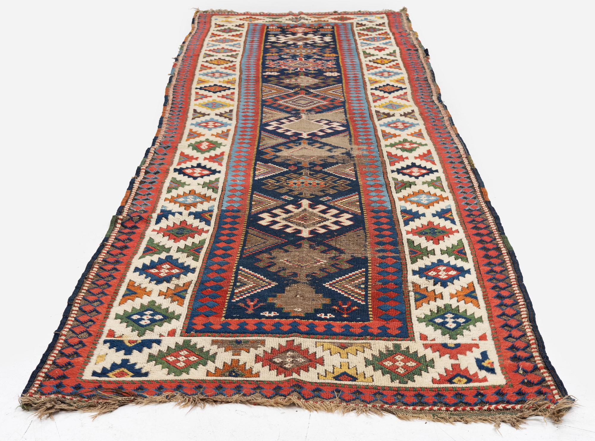 A Kazak runner, Southwest Caucasus, c. 375 x 98 cm.