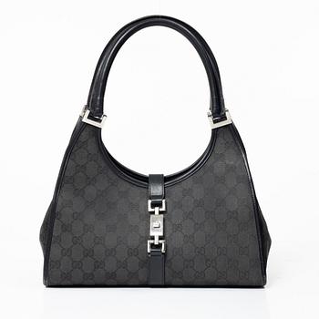Gucci, a 'Jackie' bag.