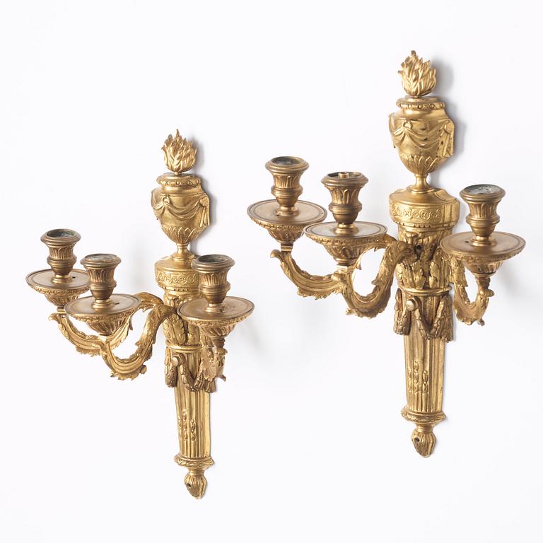 A pair of presumably Gustavian three-light wall-lights, late 18th century.