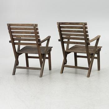 Carl Malmsten, garden furniture, a table and two armchairs. "Bergshamra", second half of the 20th century.