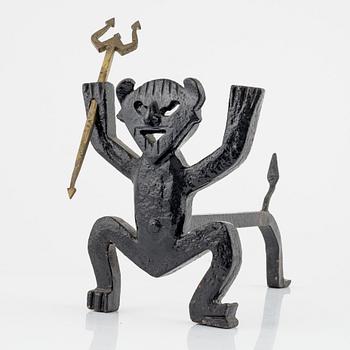 A cast iron fire dog by Eskil Björklund, second half of the 20th century.