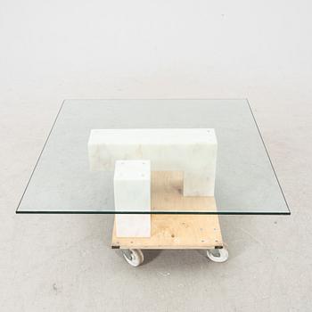 A late 20th century/21st century marble and glass coffee table.