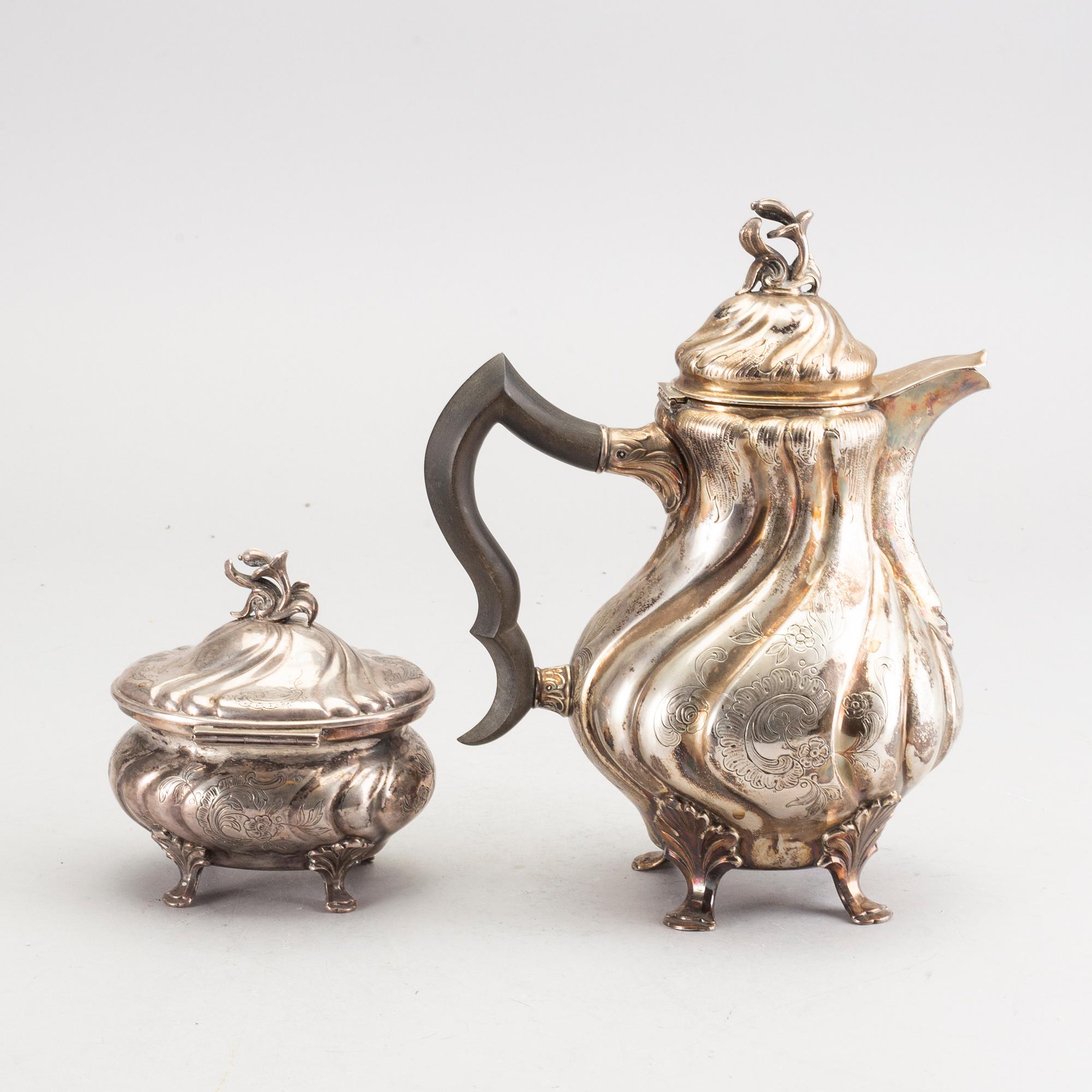 A Swedish 20th century coffeepot and suger bowl in silver mark of CG Hallberg Stockholm, total weight ca 1100 gr,