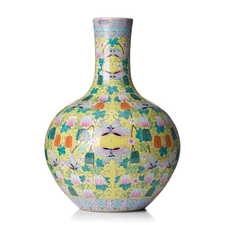 A large Chinese famille rose yellow ground vase, 20th Century with Qianlong mark.