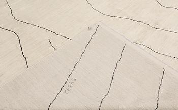 A Moroccan carpet, 335 x 258 cm.