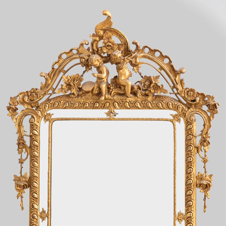 A giltwood mirror, second half of the 19th Century.