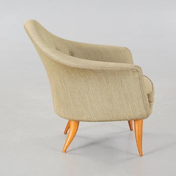 A 'Lilla Adam' easy chair by Nordiska Kompaniet.