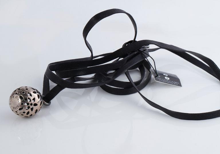 A pendant, "Blond" by Charlotte Lynggaard.
