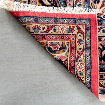 An oriental semiantique carpet ca 313x260 cm.