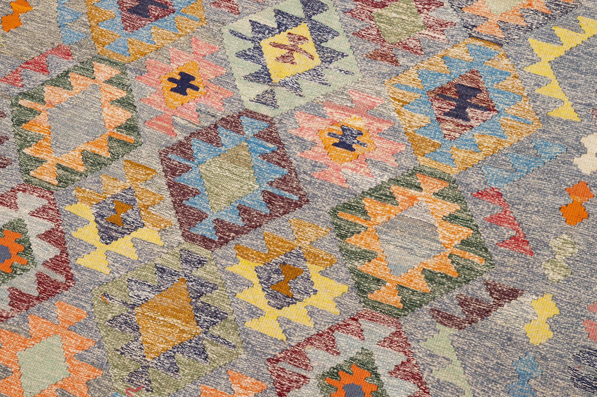 A Kelim carpet, c. 309 x 180 cm.