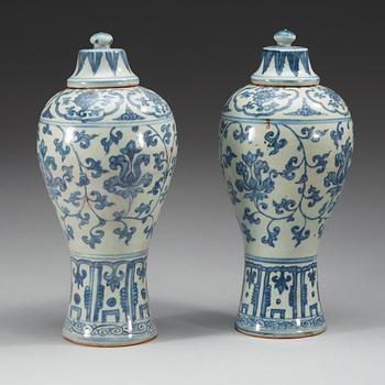 A pair of blue and white 'Meiping' vases with cover, Ming dynasty.