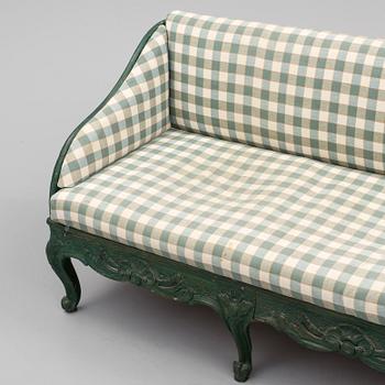 A mid 18th century rococo sofa.