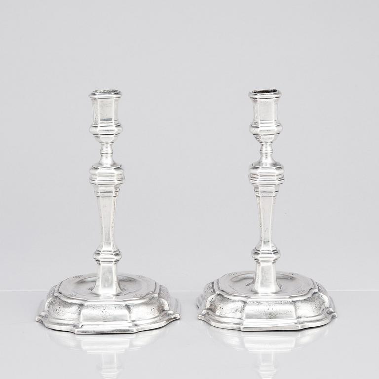 A pair of Swedish early 18th century silver candlesticks, mark of Petter Ersson Lund, Stockholm 1727.