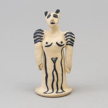 ULRICA HYDMAN-VALLIEN, a stoneware figurine, signed.