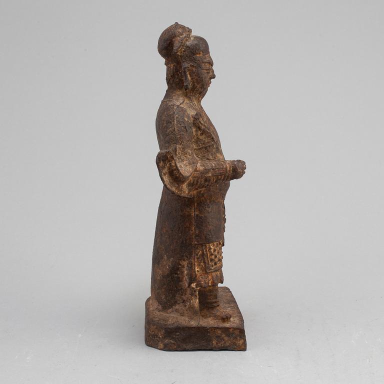A cast sculpture of a gurads man, presumably Ming dynasty.