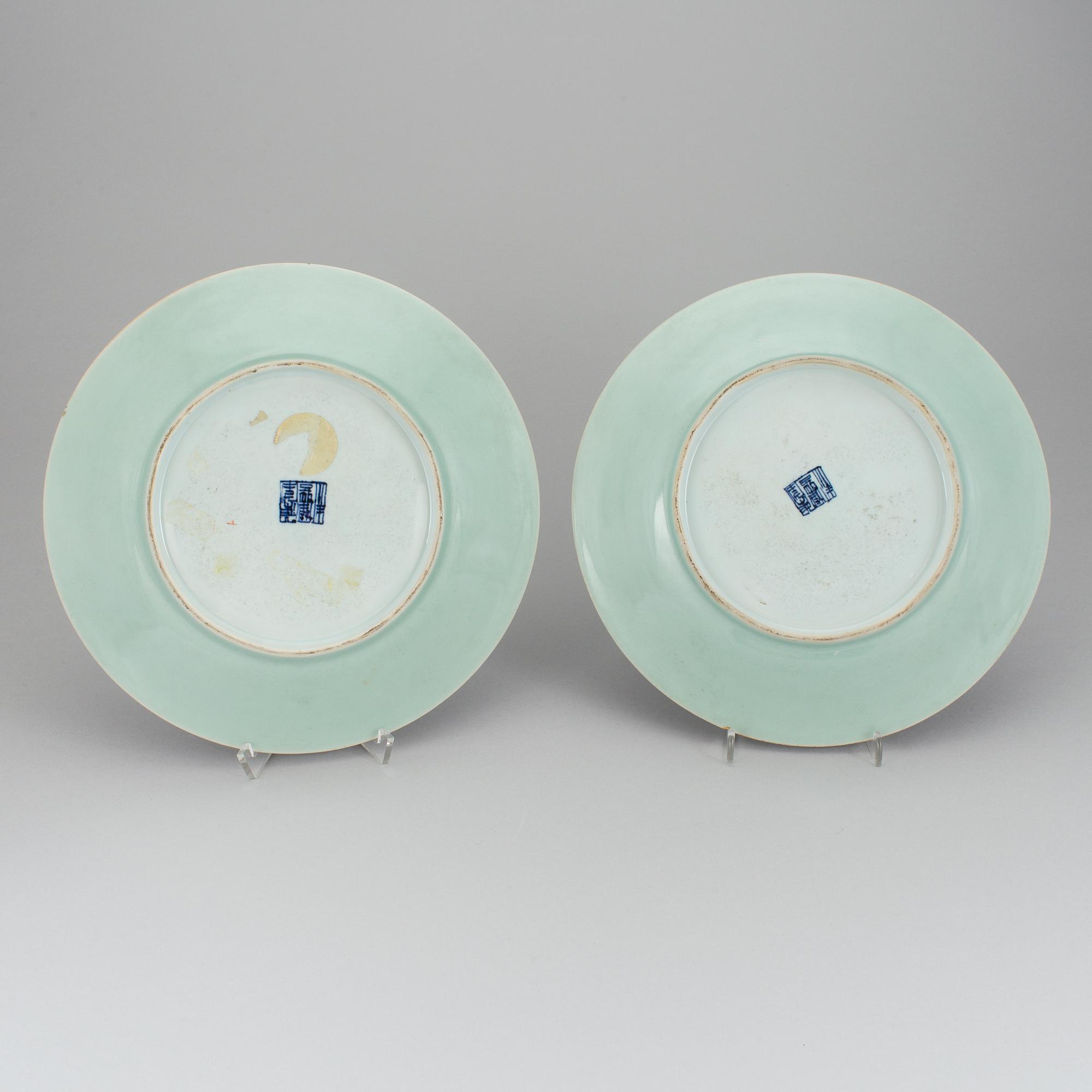 A pair of 20th Century China celadon plates.