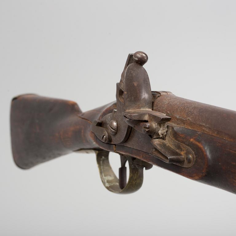 An early 19th century flintlock rifle.