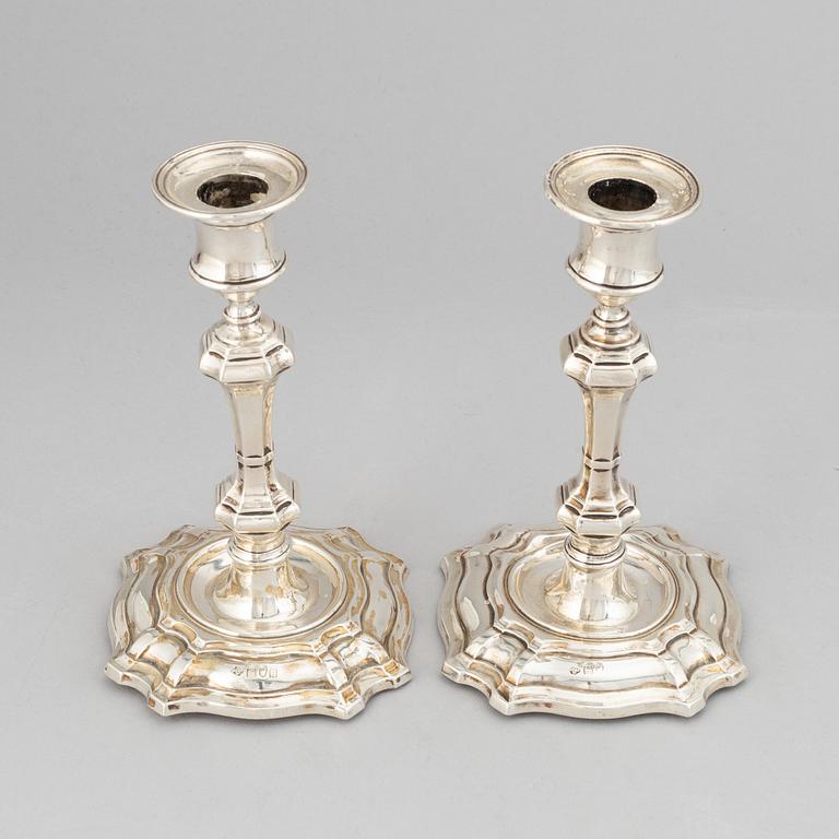 A pair of silver candlesticks, mark of William Hutton & Sons Ltd, London 1900.