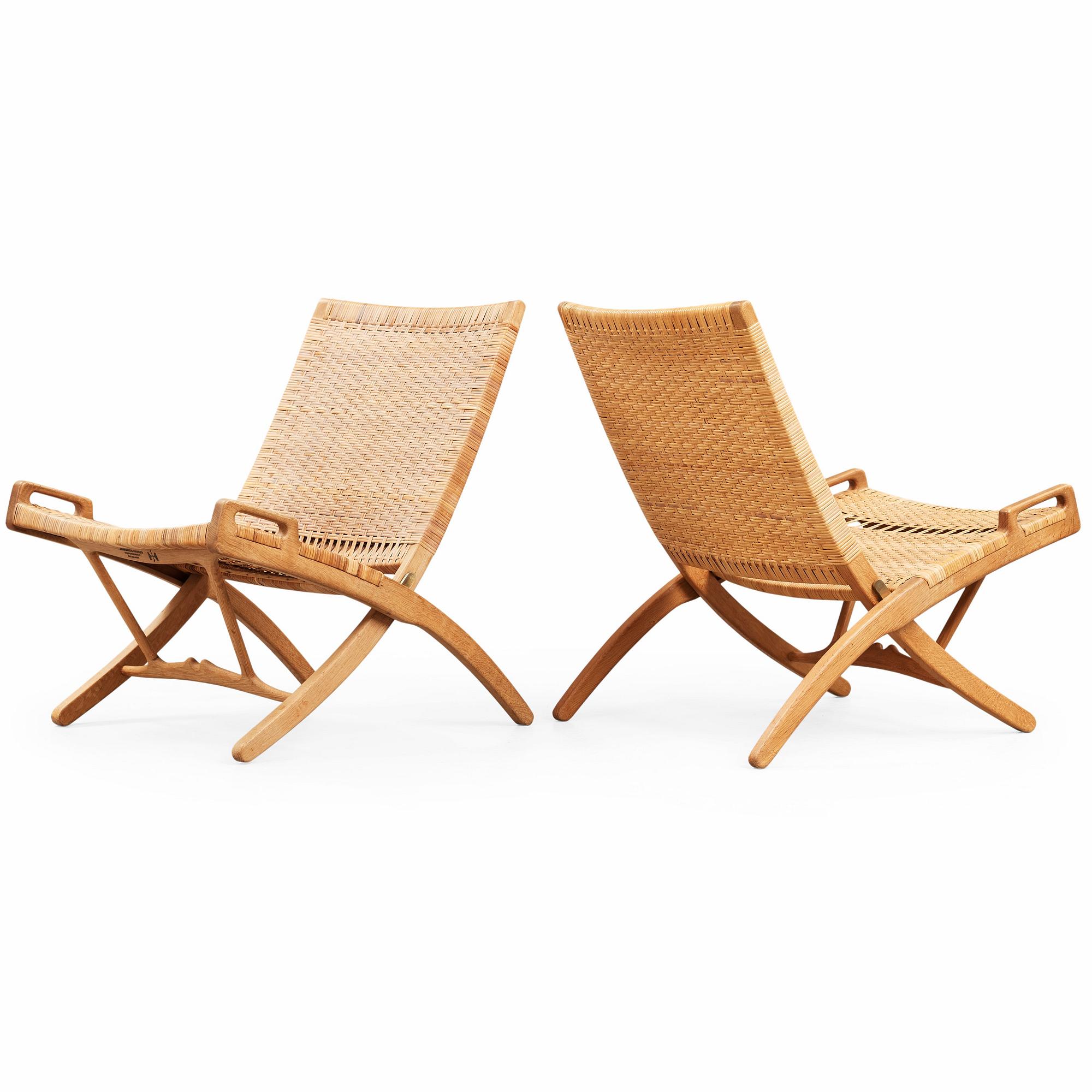 Hans J. Wegner, A pair of Hans J Wegner model 512 oak 'Folding Chairs' executed by Johannes Hansen, Denmark 1950's.