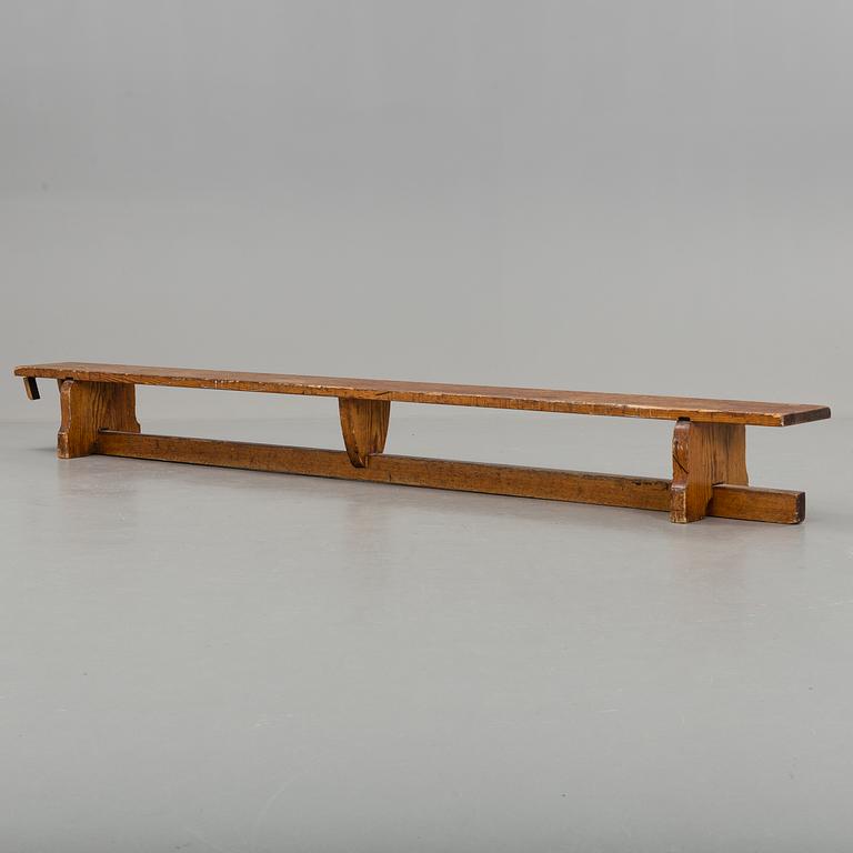 A first half of the 20th century pine bench.