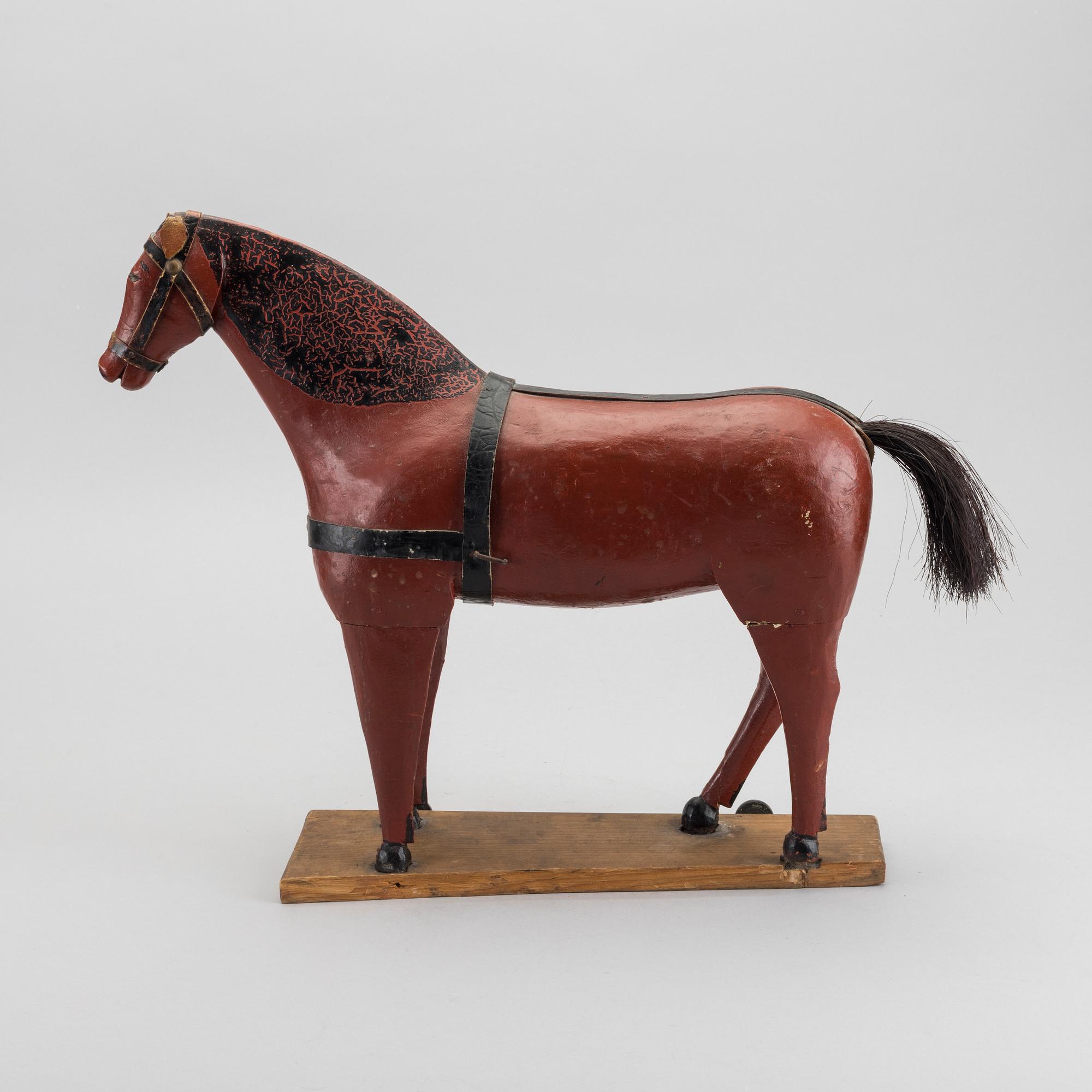 A toy wooden horse, late 19th cenury / turn of the century 1900.
