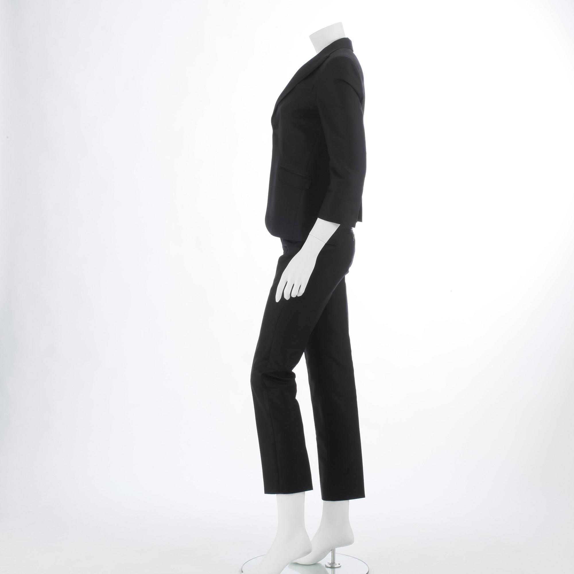 DSQUARED, a black cotton and silk two-piece suit consisting of jacket and pants. Size 42.