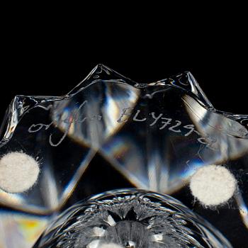 ERIKA LAGERBIELKE, a glass 'Zodiak' vase and two bowls from Orrefors.