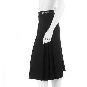 CÉLINE, a green wool skirt. Size 42.