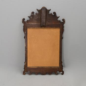 An 18th century rococo mirror.