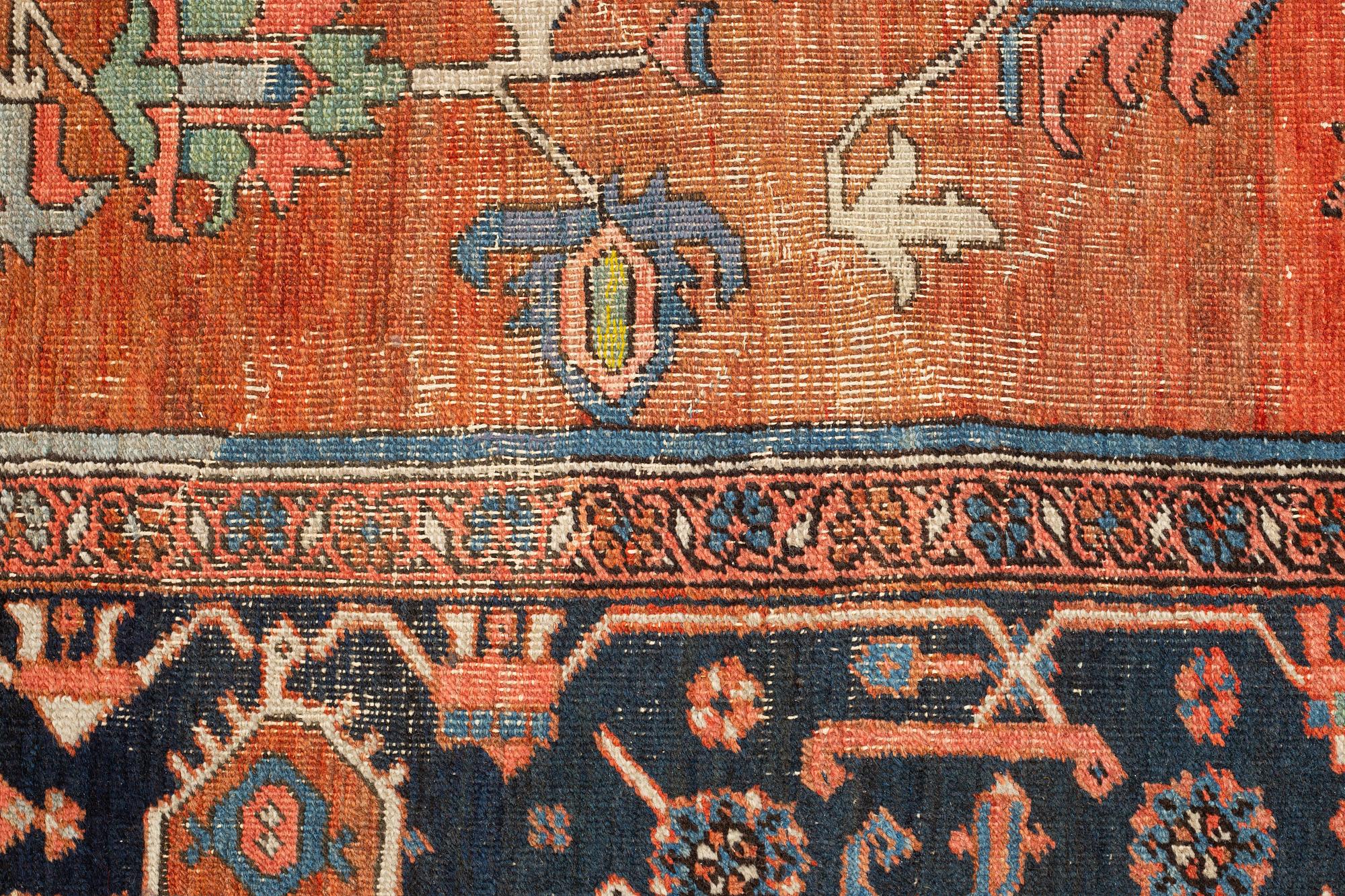 A carpet, an antique Heriz, ca 469,5-471 x 300-309,5 cm.