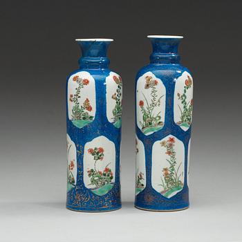 A matched pair of powder blue vases with 'famille-verte' enamels, Qing dynasty, Kangxi (1622-1722).