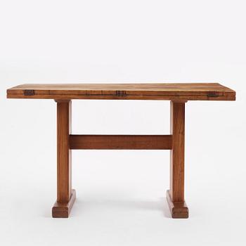 Carl Malmsten, a stained pine table, Sweden, 1930s.