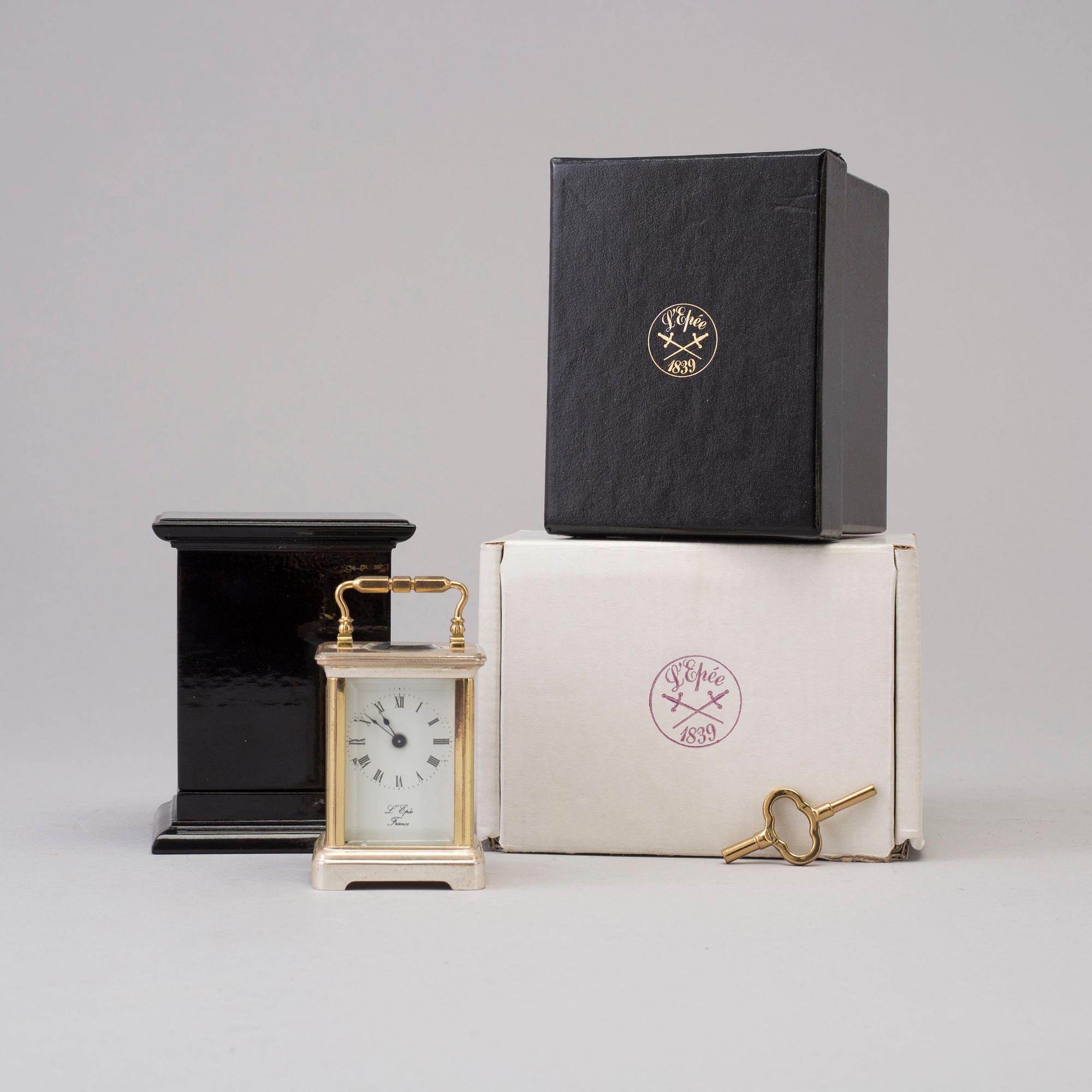 L´EPÉE, Fondée en 1839, travel alarm clock, lever escapement, second half of the 20th century.