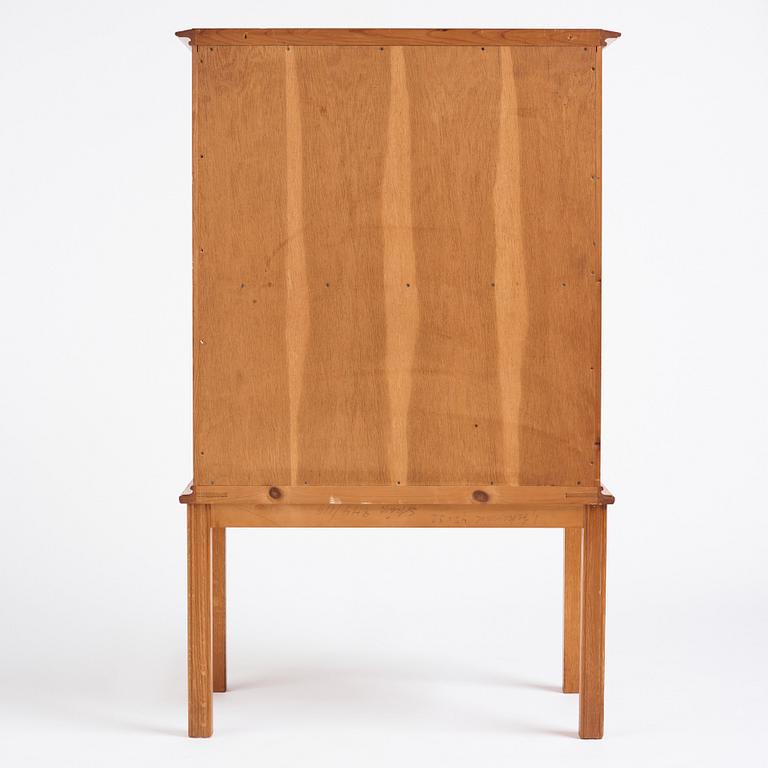 Oscar Nilsson, attributed to, a Swedish Modern oak cabinet, 1940s.