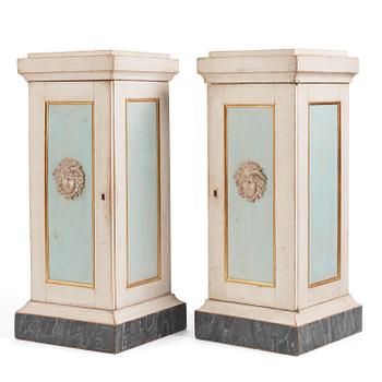 5. A pair of late Gustavian-style column-shaped cabinets, Stoockholm, early 19th century and later.