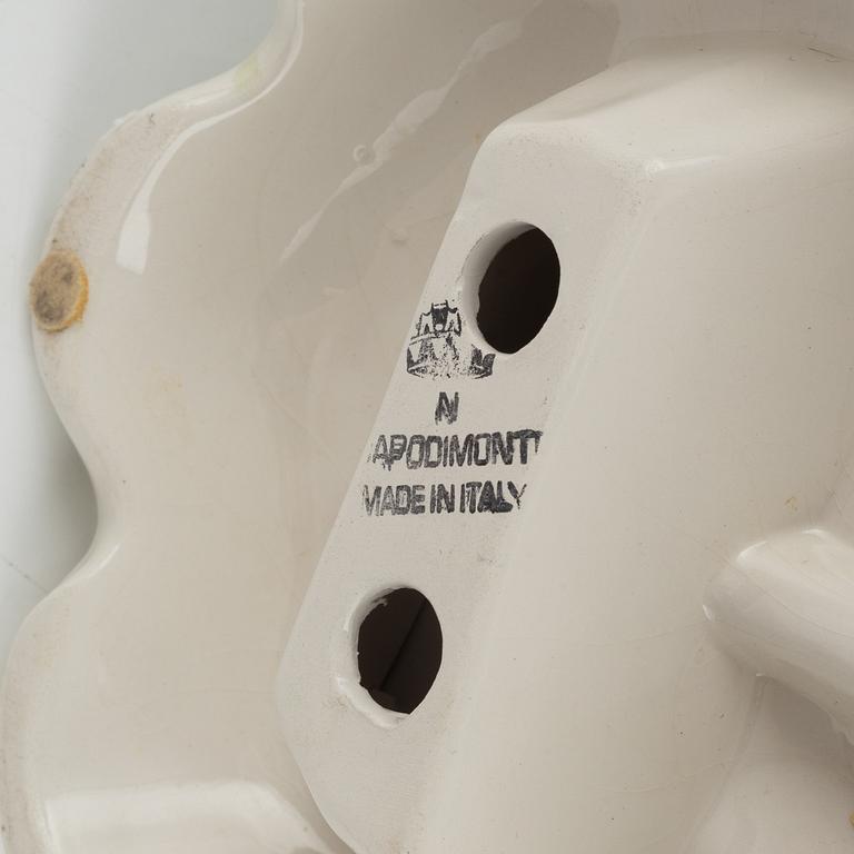 Capodimonte, a pair of creamware figurines, Italy mid 20th century.
