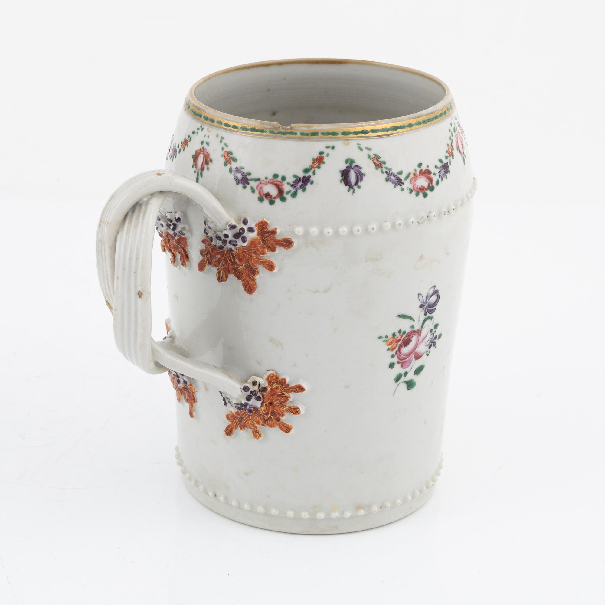 A porcelain Famille Rose Mug and three Dishes, China, Qinlong (1736-95).