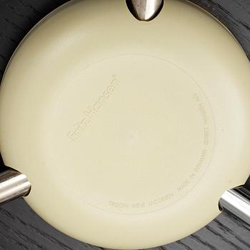 An Arne Jacobsen "Centenary Package" comprising three "Ant Chairs" and an eggshaped table, Fritz Hansen, Denmark.