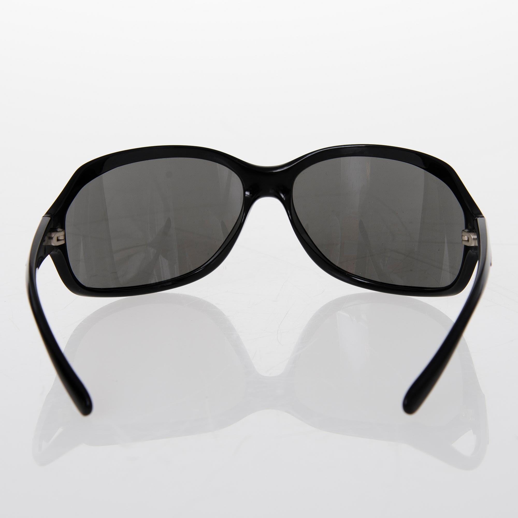 Prada and Chanel Sunglasses.