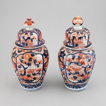 A pair of imari vases with covers, Japan, Meiji (1868-1912).
