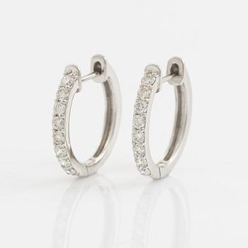 Brilliant cut diamond hoop earrings, total 0,58 ct.