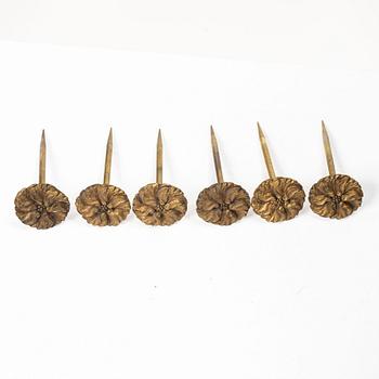 Twelve curtain tiebacks, 19th Century.
