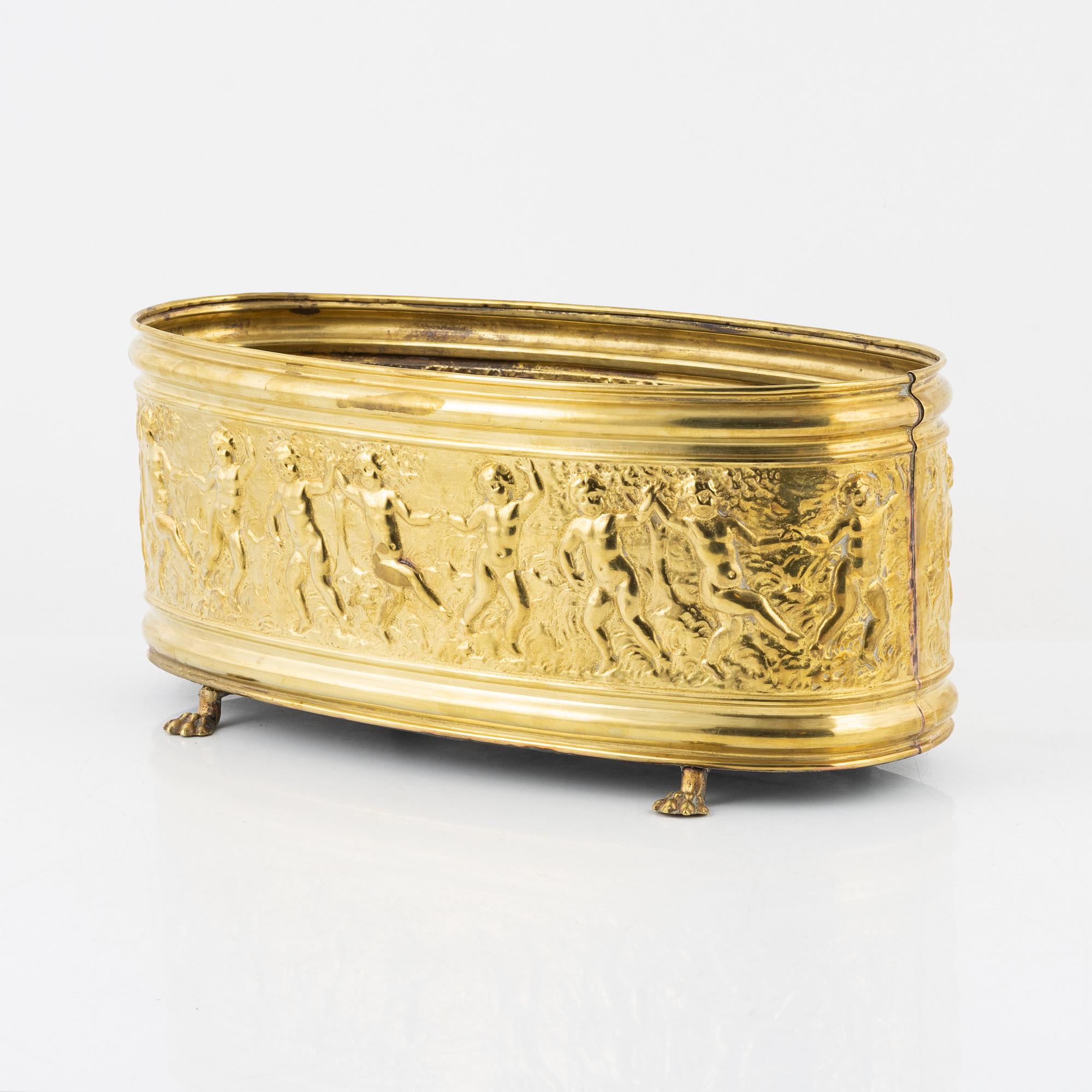 A brass jardiniere, circa 1900.