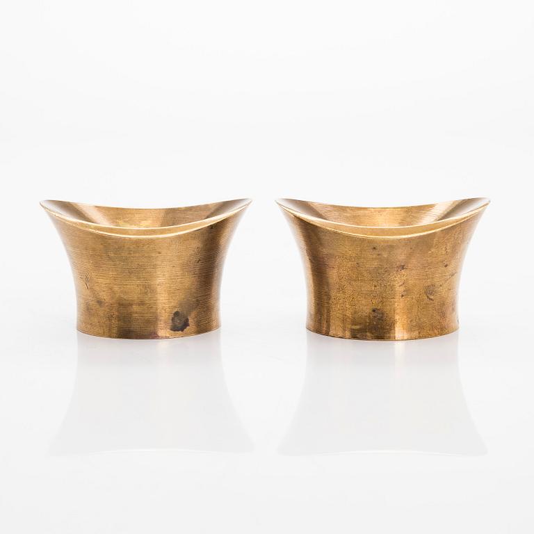 Tapio Wirkkala,  a pair of bronze candle holders for Kultakeskus Oy.