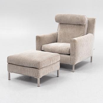 A 'Streamline' armchair with a foot stool, Eilersen.